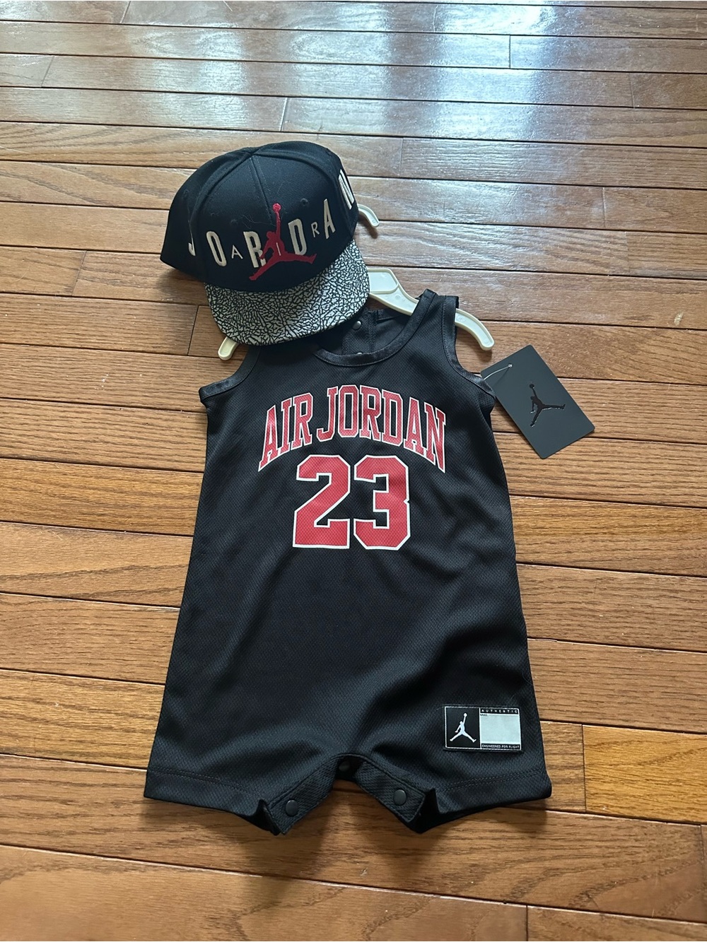 Jordan Black Romper & Cap Set with Red Accents